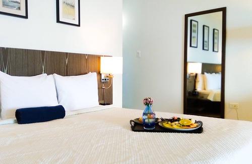 Dickenson Bay Hotel | Relaxing Retreat at Trade Winds Hotel with Ocean View Amenities