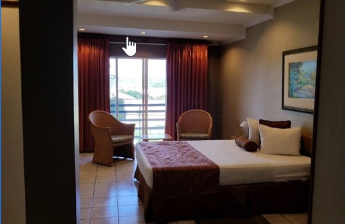 San Fernando Hotel | Discover Tradewinds Hotel: Family-Friendly with Pool & Dining