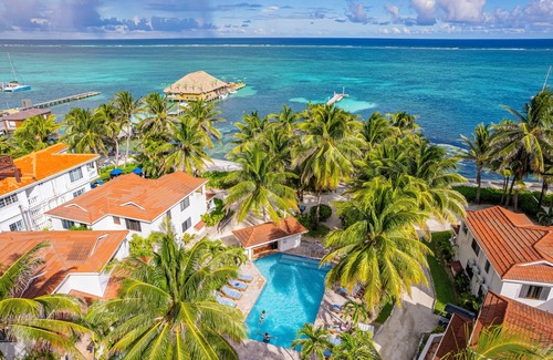 San Pedro Condo | Beachfront Retreat at Tradewinds Paradise Villas - 9/10 Rated