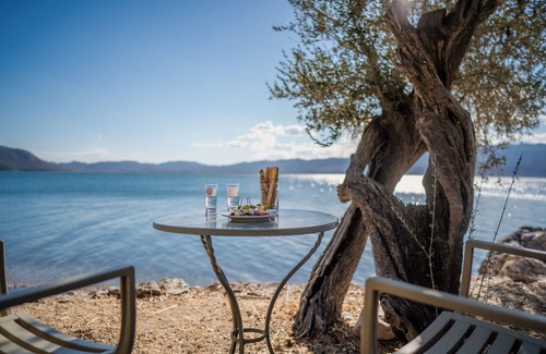Mytilene Villa | Seafront Stone House Amid Olive Grove with Ocean Views