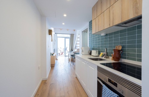 En Corts Apartment | Traditional Valencian House with Spa & Terrace by Florit Flats