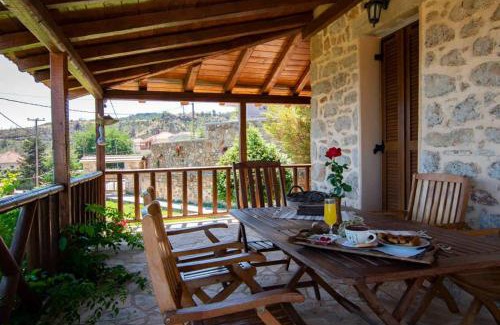Corinthia Region House | Idyllic Stone Home with Scenic Views & Pet-Friendly Amenities