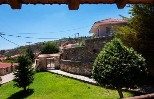 Corinthia Region House | Idyllic Stone Home with Scenic Views & Pet-Friendly Amenities