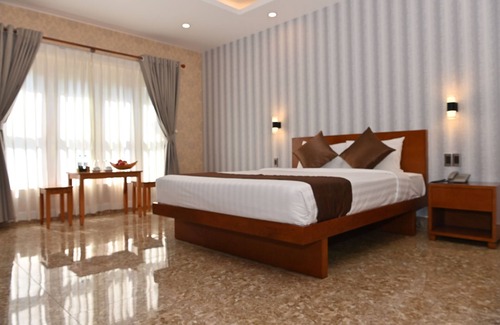 Long Hai Hotel | Explore Tran Chau Beach & Resort: Family-Friendly Retreat