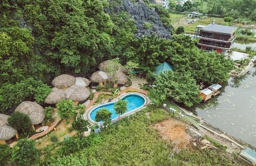 Hoa Lu Cabin | Discover Trang An Legend: Eco-Friendly Haven with Ocean Views