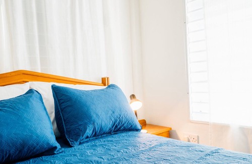 Hillsborough Apartment | Serene 2 Bed Apartment with Ocean View & Hot Tub Retreat