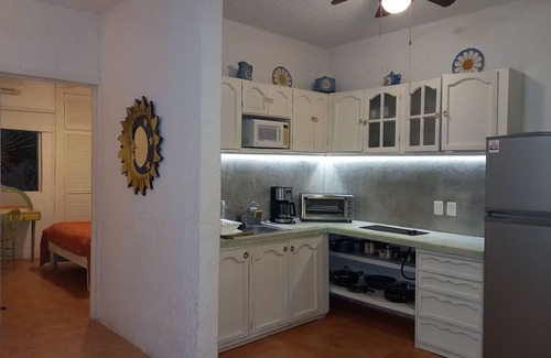 Puerto Juarez Apartment | Serene Oceanfront Getaway with Spa and Pool Amenities
