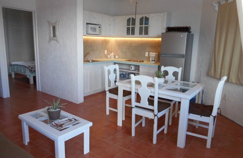 Puerto Juarez Apartment | Serene Oceanfront Getaway with Spa and Pool Amenities
