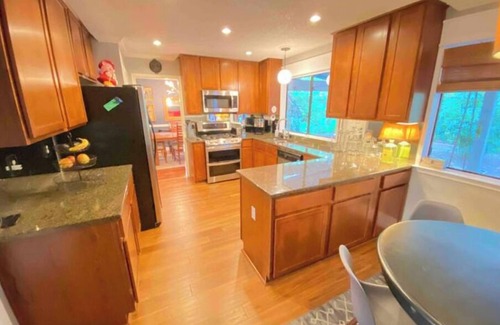 Los Indios House | Tranquil Family Retreat in NW Austin, Hot Tub, Office, & Backyard Escape