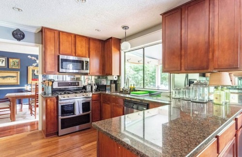 Los Indios House | Tranquil Family Retreat in NW Austin, Hot Tub, Office, & Backyard Escape