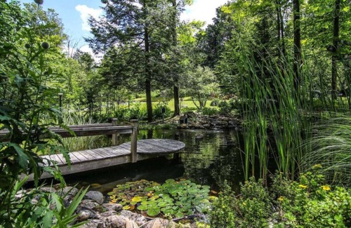 Knowlton Ski Chalet | Tranquil Haven near the Charming Village of Knowlton - Sleeps 12 - Whole House & 2 Acres with Pond, Bridge, Grounds, and Woods