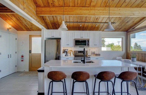 Central Okanagan House | Tranquil lake view retreat in the Okanagan. Hot tub and Pet-Friendly!