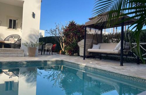 Sosua Apartment | Serene Getaway with Oceanfront Views & Family-Friendly Fun