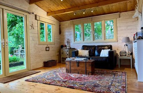 Weston Longville House | Pet Friendly Log Cabin with Breathtaking Sunset Views