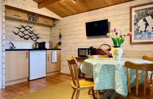Weston Longville House | Pet Friendly Log Cabin with Breathtaking Sunset Views