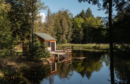 Bobcaygeon Ski Chalet | Tranquil Oasis in Trent Lakes w/Private Ponds, Fire Pit, Game Room & Hot Tub