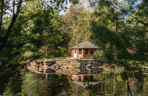 Bobcaygeon Ski Chalet | Tranquil Oasis in Trent Lakes w/Private Ponds, Fire Pit, Game Room & Hot Tub