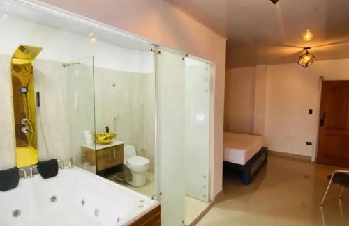 La Dorada Hotel | Discover Tranquilandia: Family-Friendly Retreat with Hot Tub