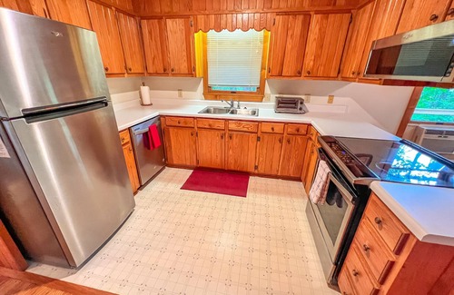 Lansing Cabin | Serene River Views - Pet Friendly & Minutes to Town