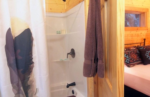 Cat Spring Cabin | Tranquility Cabin with Hot Tub & Ocean View Retreat