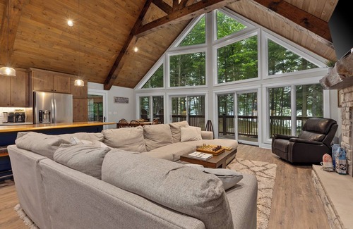 Lac du Flambeau House | Tranquility Point | LUX lakefront retreat, private dock, firepit, kayak, & AC