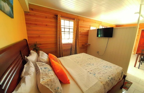 Pointe Michel Cabin | Cozy Tranquility Suite with Ocean View and Pool Access