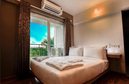 Nedumbassery Apartment | Convenient Transit Suites with Pool and Restaurant Access