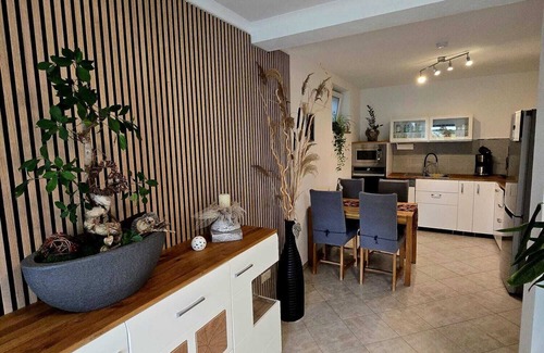 Oberzissen Apartment | Relaxing Stay by the Garden Pond with Family-Friendly Amenities