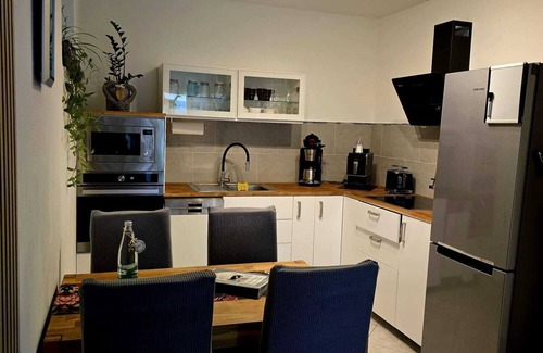 Oberzissen Apartment | Relaxing Stay by the Garden Pond with Family-Friendly Amenities