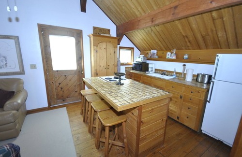 Kewadin Cabin | Experience Beachfront Bliss at Traverse City Lake Home