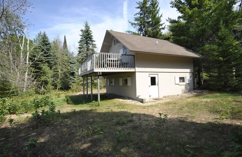 Kewadin Cabin | Experience Beachfront Bliss at Traverse City Lake Home