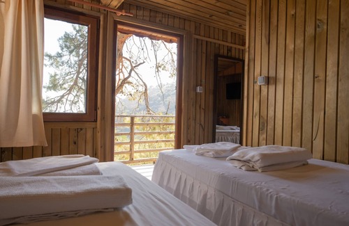 Kabak Valley Hotel | Idyllic Tree Houses with Pool and Ocean View Awaits You