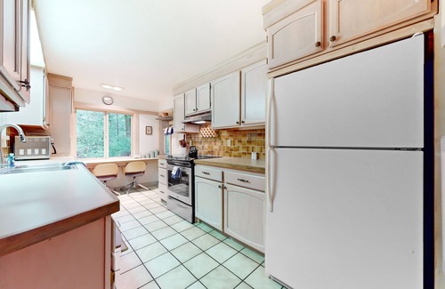 Burley House | Idyllic Retreat with Pool Access and Cozy Fireplace