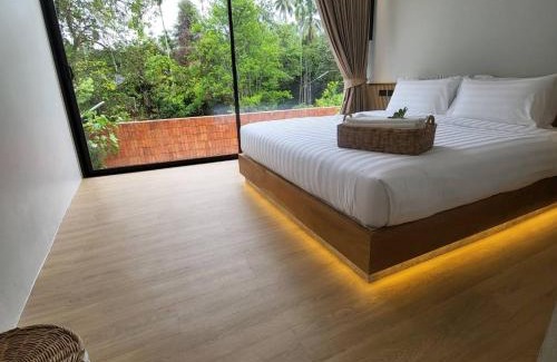 Lang Suan Hotel | Discover Tree Space Living: A Family-Friendly Retreat
