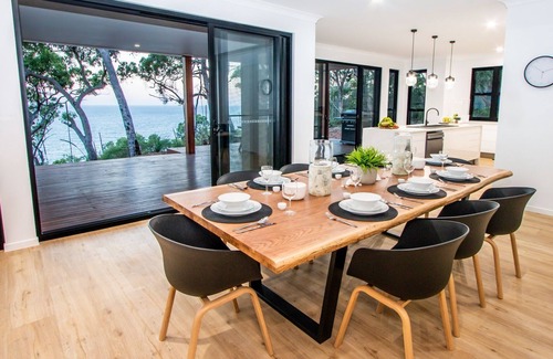 Agnes Water House | Relax at Tree Top Breezes with Oceanfront Pool Access