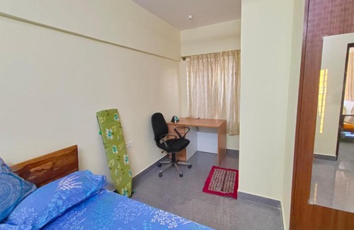 Bengaluru Apartment | Cozy Tree Top: Pet-Friendly Stay with Family Breakfast