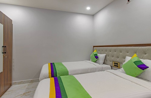 Guntur Hotel | Comfortable Stay at Treebo Abhi Suites, Guntur with Breakfast