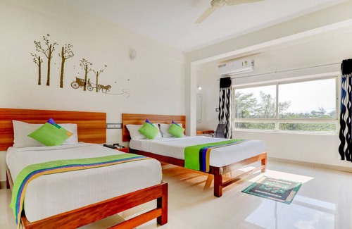 Kushalnagar Hotel | Budget-Friendly Treebo Atithi Comforts Near Nisargadhama