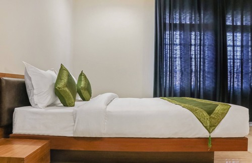 Kozhikode Hotel | Welcoming Treebo Casino: Family-Friendly & Accessible Stay