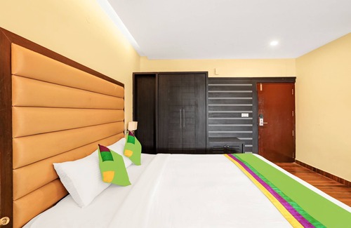 Stuart Hill House | Budget-Friendly Treebo Doha King with Family Amenities