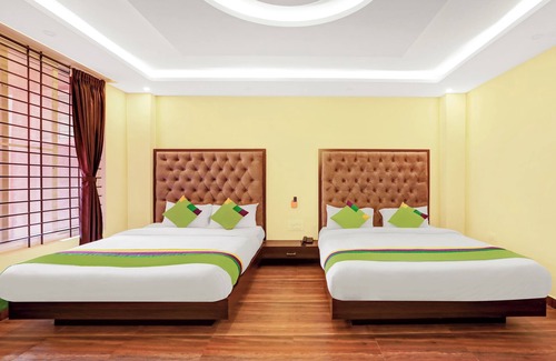 Stuart Hill House | Budget-Friendly Treebo Doha King with Family Amenities