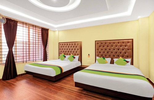 Stuart Hill House | Budget-Friendly Treebo Doha King with Family Amenities