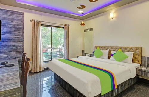 Wai Hotel | Budget-Friendly Treebo Dreamworld with Family Amenities