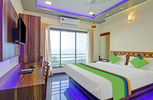 Wai Hotel | Budget-Friendly Treebo Dreamworld with Family Amenities