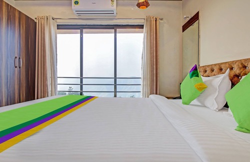 Wai Hotel | Budget-Friendly Treebo Dreamworld with Family Amenities