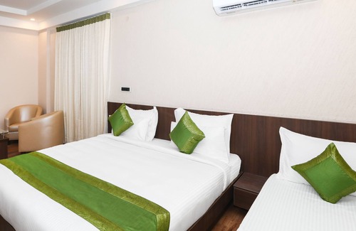 Gonikoppal Hotel | Explore Treebo Durga Boji Grand: Family-Friendly Retreat