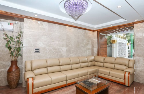 Gonikoppal Hotel | Explore Treebo Durga Boji Grand: Family-Friendly Retreat