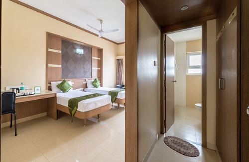 Ram Nagar Hotel | Budget-Friendly Stay at Treebo ESS Grande: Family-Centric Amenities