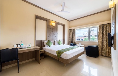 Ram Nagar Hotel | Budget-Friendly Stay at Treebo ESS Grande: Family-Centric Amenities