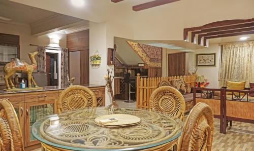 Aundh Hotel | Cozy Treebo Excellent Home with Kitchen & Breakfast Options